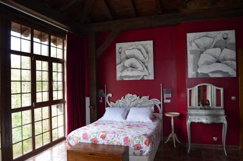 Imagen de la habitación del Hotel La Casa del Puente. Foto 9