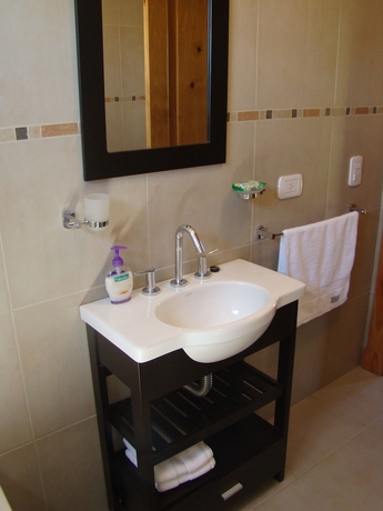 Imagen de la habitación del Hotel La Cascada Duplex. Foto 19