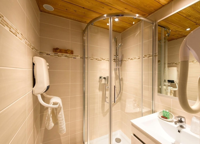 Imagen de la habitación del Hotel La Cascade. Foto 12