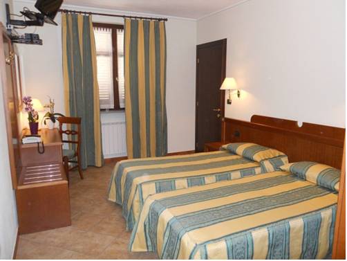 Imagen de la habitación del Hotel La Cascina Di Villa Due. Foto 7