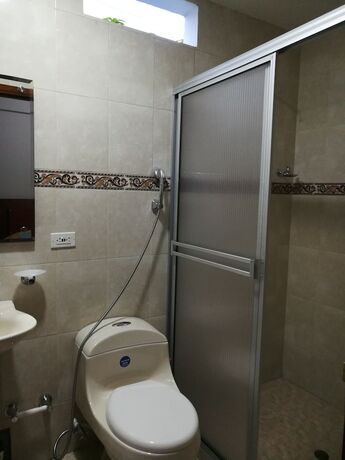 Imagen de la habitación del Hotel La Casita Morada. Foto 18