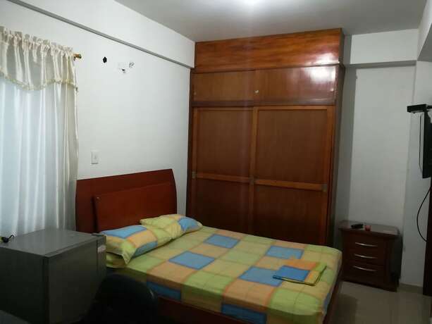 Imagen de la habitación del Hotel La Casita Morada. Foto 19