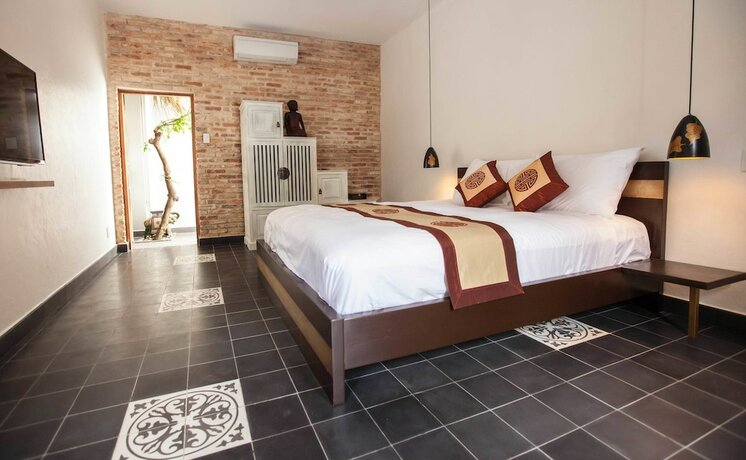 Imagen de la habitación del Hotel La Casita Saigon. Foto 16