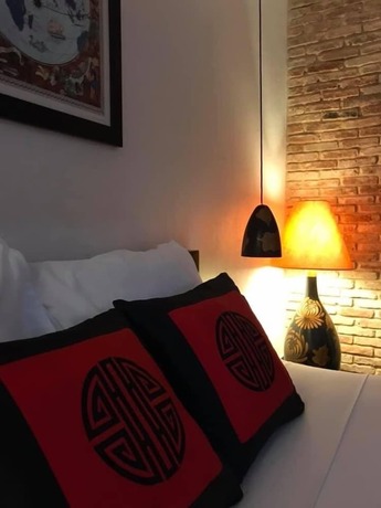 Imagen de la habitación del Hotel La Casita Saigon. Foto 17