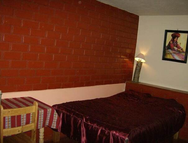 Imagen de la habitación del Hotel La Casita de mi Abuela. Foto 12