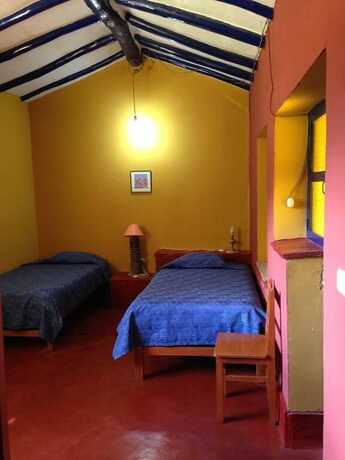 Imagen de la habitación del Hotel La Casita de mi Abuela. Foto 13