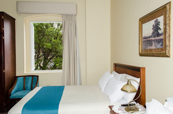 Imagen de la habitación del Hotel La Casona, Cuenca. Foto 4