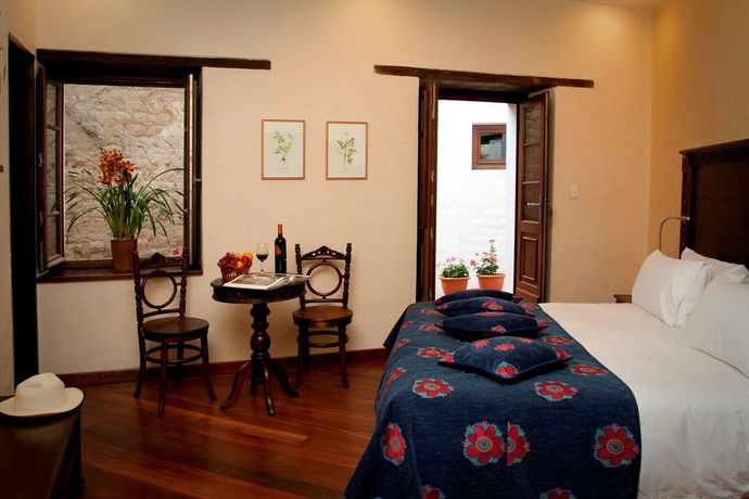 Imagen de la habitación del Hotel La Casona De La Ronda Boutique and Luxury Apartments. Foto 6