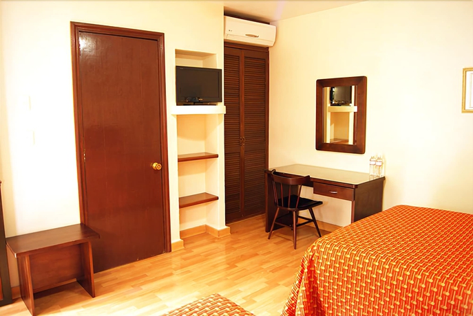 Imagen de la habitación del Hotel La Casona Del Llano. Foto 8