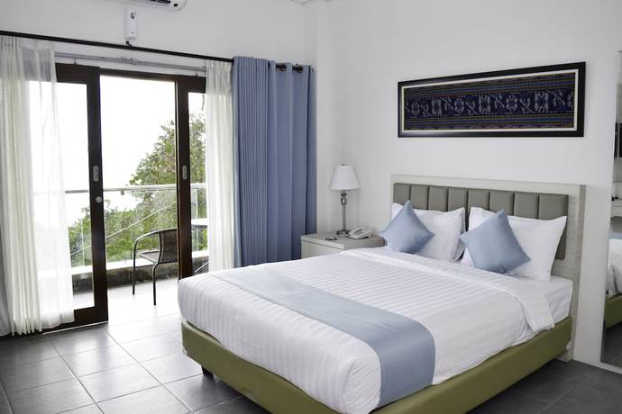 Imagen de la habitación del Hotel La Cecile and Cafe Komodo. Foto 7