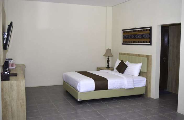 Imagen de la habitación del Hotel La Cecile and Cafe Komodo. Foto 9