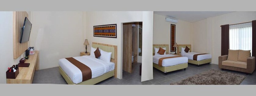 Imagen de la habitación del Hotel La Cecile and Cafe Komodo. Foto 12