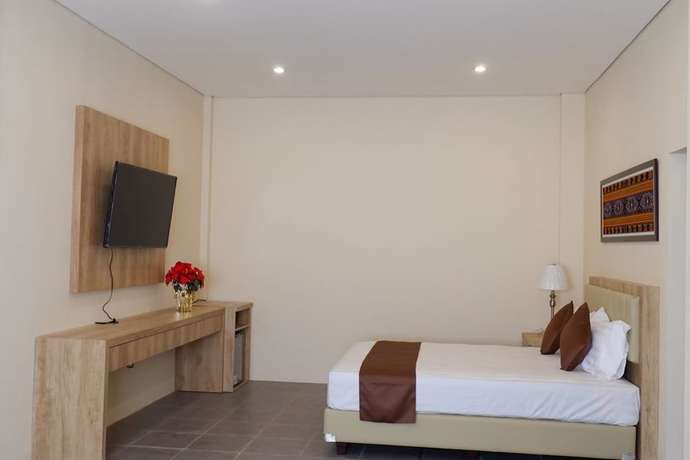 Imagen de la habitación del Hotel La Cecile and Cafe Komodo. Foto 16