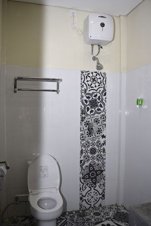 Imagen de la habitación del Hotel La Cecile and Cafe Komodo. Foto 18