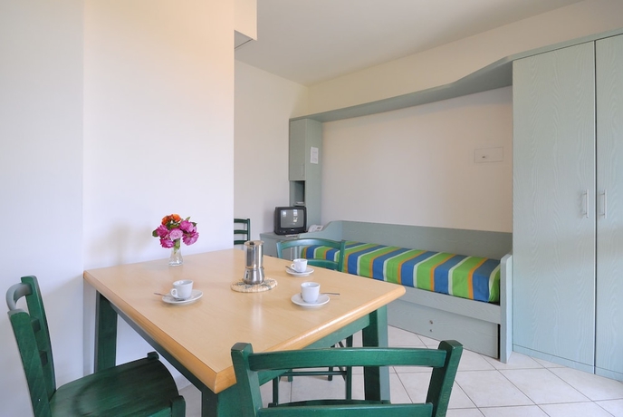 Imagen de la habitación del Hotel La Cecinella Apartments. Foto 8