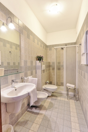 Imagen de la habitación del Hotel La Cecinella Apartments. Foto 12