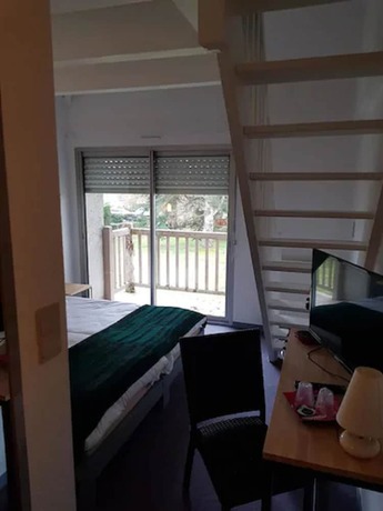 Imagen de la habitación del Hotel La Chaumière du Bois. Foto 13