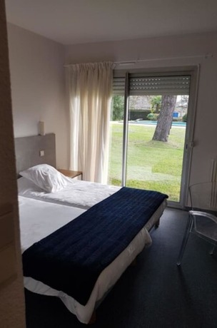 Imagen de la habitación del Hotel La Chaumière du Bois. Foto 14