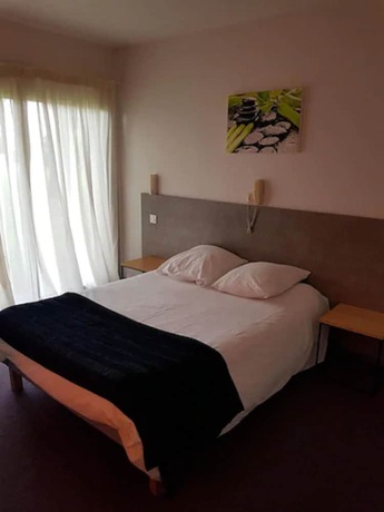 Imagen de la habitación del Hotel La Chaumière du Bois. Foto 17