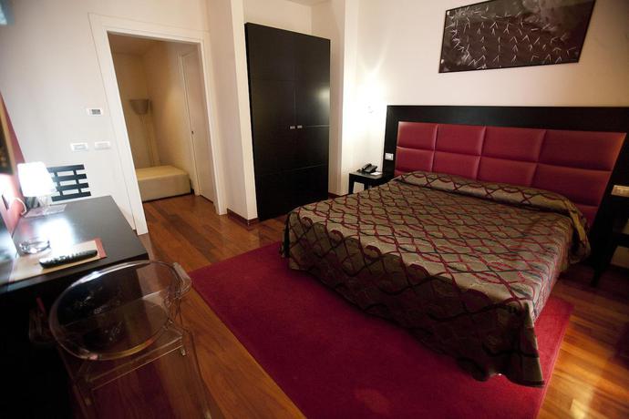 Imagen de la habitación del Hotel La Chicca Palace. Foto 6