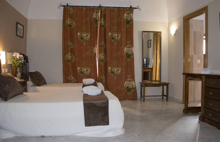Imagen de la habitación del Hotel La Chiquita. Foto 12