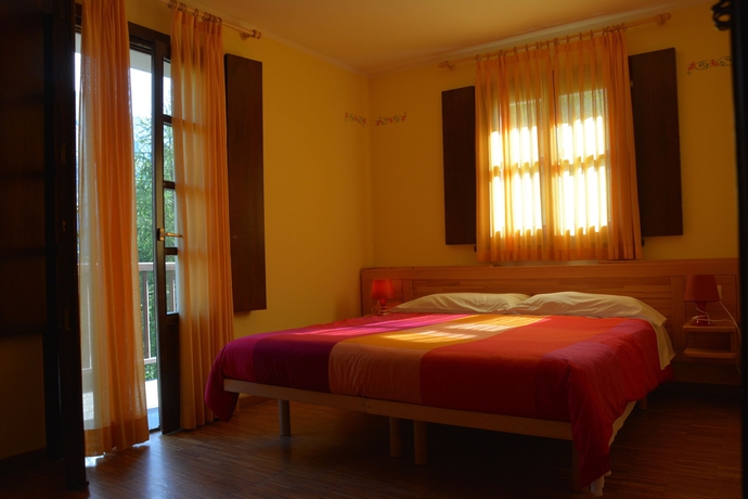 Imagen de la habitación del Hotel La Cialvrina Resort. Foto 10