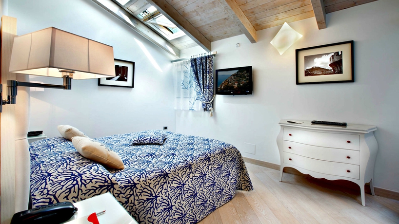 Imagen de la habitación del Hotel La Ciliegina Lifestyle. Foto 5