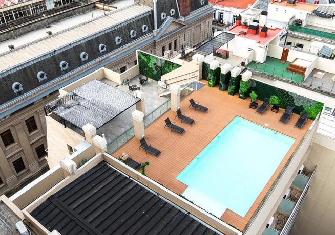 Imagen de la piscina del Hotel La Cisterna by DOT Suites. Foto 9