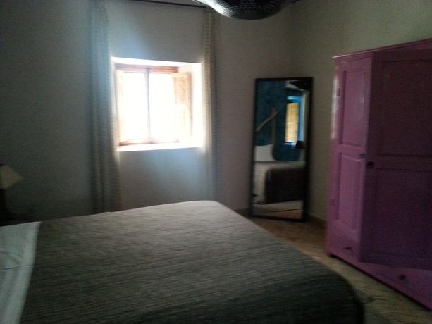 Imagen de la habitación del Hotel La Cl&eacute; Des Huiles. Foto 9