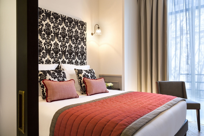 Imagen de la habitación del Hotel La Clef Tour Eiffel Paris. Foto 10