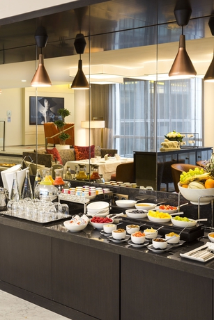 Imagen del bar/restaurante del Hotel La Clef Tour Eiffel Paris The Crest Collection. Foto 3