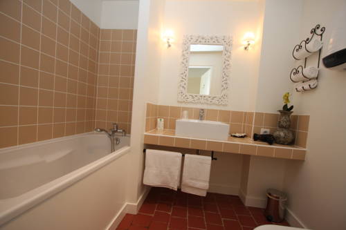 Imagen de la habitación del Hotel La Closeraie. Foto 13