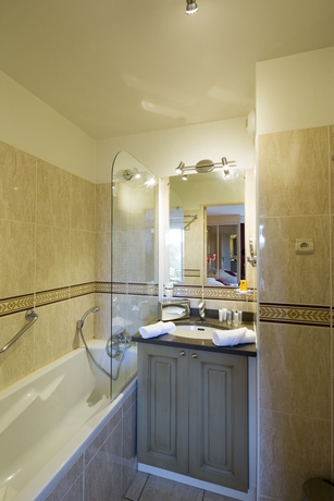 Imagen de la habitación del Hotel La Closerie Deauville. Foto 7