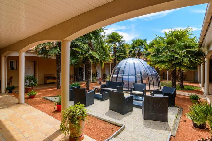 Imagen de los exteriores del Hotel La Closerie. Foto 6