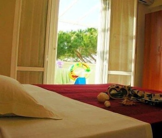 Imagen de la habitación del Hotel La Coccinella. Foto 23