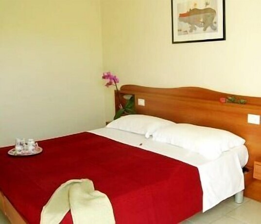 Imagen de la habitación del Hotel La Coccinella. Foto 27