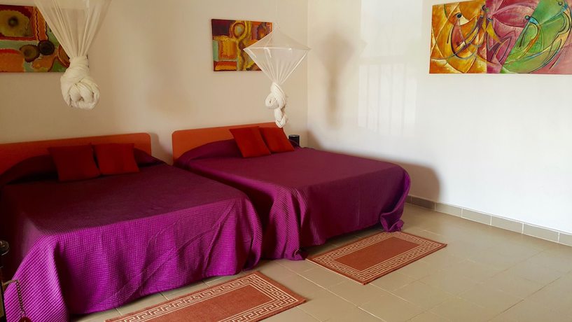 Imagen de la habitación del Hotel La Coccinelle. Foto 10