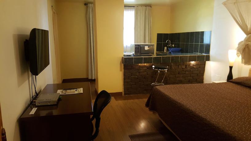 Imagen de la habitación del Hotel La Coccinelle. Foto 17