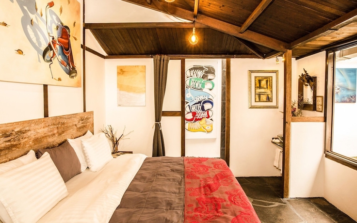 Imagen de la habitación del Hotel La Colina Cottage. Foto 10