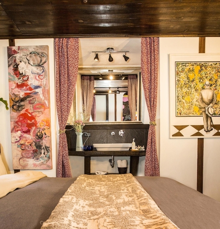 Imagen de la habitación del Hotel La Colina Cottage. Foto 11