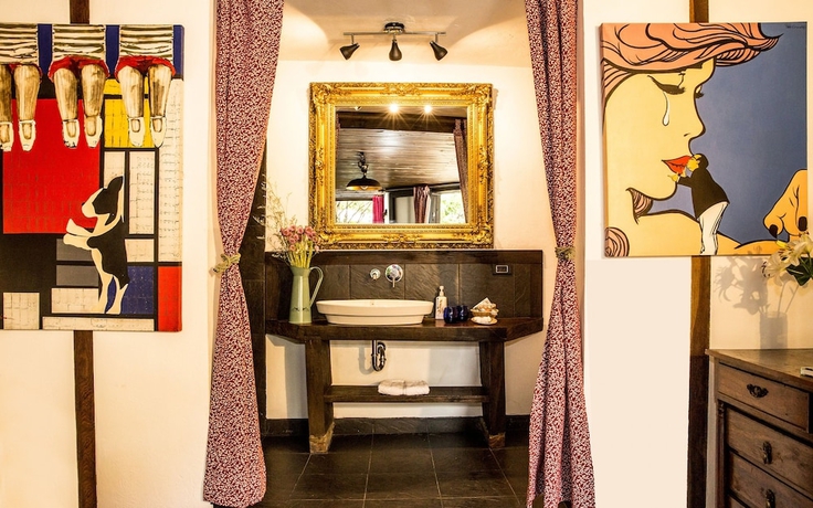 Imagen de la habitación del Hotel La Colina Cottage. Foto 13