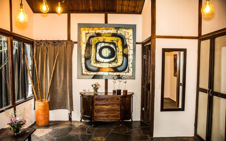 Imagen de la habitación del Hotel La Colina Cottage. Foto 14