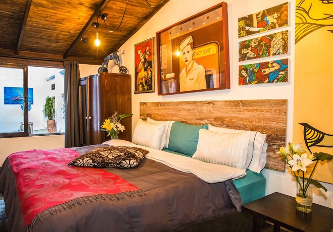 Imagen de la habitación del Hotel La Colina Cottage. Foto 18