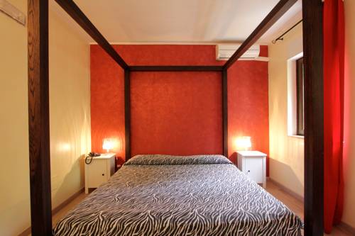 Imagen de la habitación del Hotel La Compagnia Del Viaggiatore. Foto 6