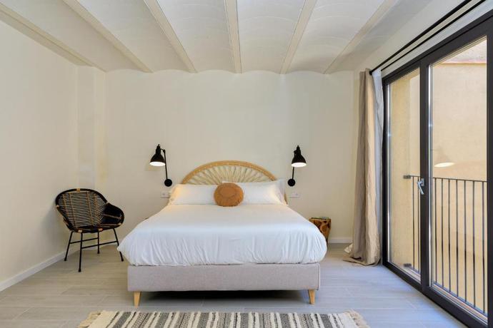 Imagen de la habitación del Hotel La Comuna Residence Boutique. Foto 5