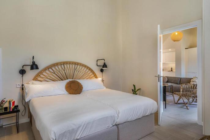 Imagen de la habitación del Hotel La Comuna Residence Boutique. Foto 6