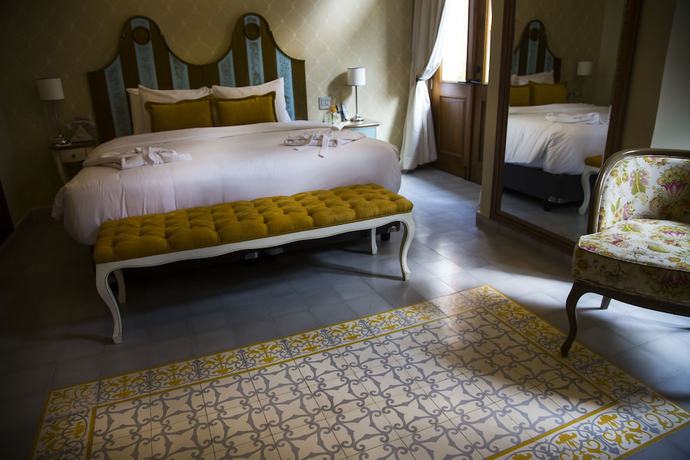 Imagen de la habitación del Hotel La Concordia Boutique. Foto 8