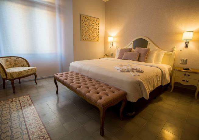 Imagen de la habitación del Hotel La Concordia Boutique. Foto 12