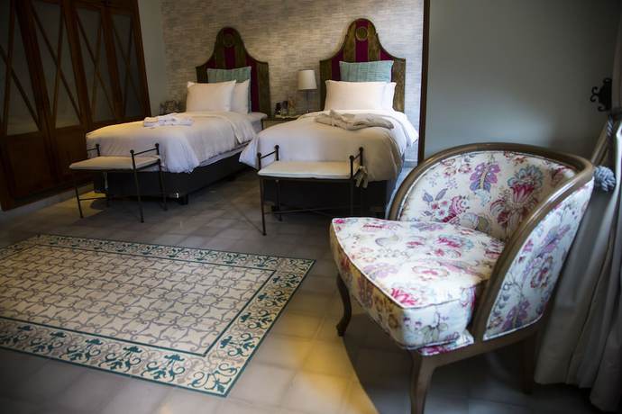 Imagen de la habitación del Hotel La Concordia Boutique. Foto 15