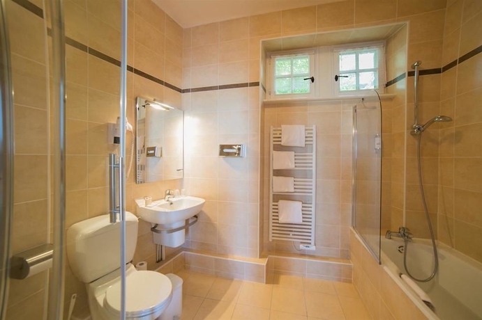 Imagen de la habitación del Hotel La Confiance. Foto 6